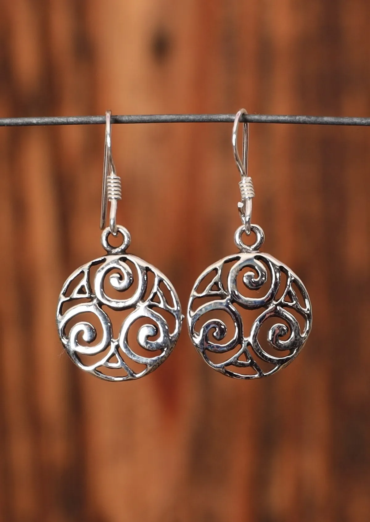 Encircled Triskele Silver Earrings